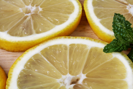 a cuted yellow lemon with mintの写真素材