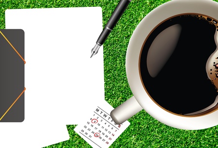 Top view cup of coffee on green grass,and paper の写真素材