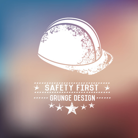 Safety first badge on blur background,vectorのイラスト素材
