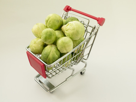 Brussels sprouts in a toy trolley from the supermarketの写真素材
