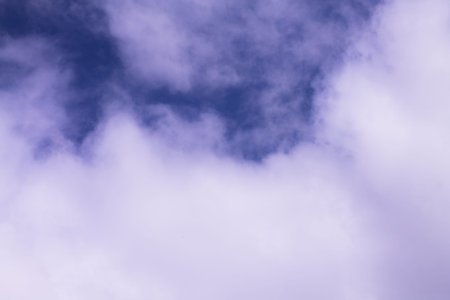 Blue sky with cirrus large clouds.