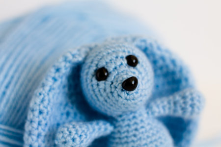 knitted bunny. blue bunny from yarn. children's soft toys.