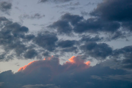 Cloudscape, Colored Clouds at Sunset near the Ocean on a Cloudy Day