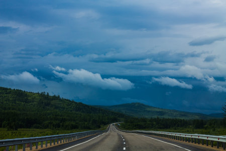Clouds over the mountain road in the Altai Republic, Russia