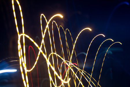 light trails on the street in the city at night. long exposureの写真素材