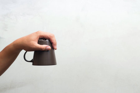 Empty coffee Cup in Handの写真素材