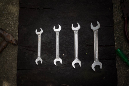 Wrench on old wooden broadの写真素材