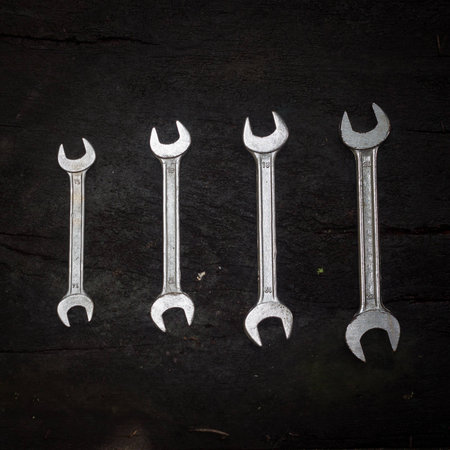 Wrench on old wooden broadの写真素材