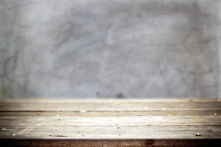 Old table with Dirty concrete wall