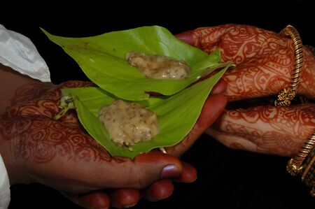 Hands combined in a traditional celebration festivalの写真素材