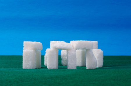 Sugar stonehenge on green & blue backgroundの写真素材