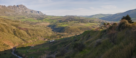 Panoramic view of Sicily landscape  green valley, river and hills near the town Termini Imerese の写真素材
