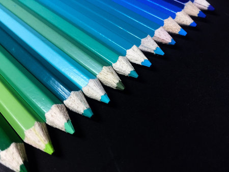 Cool tone of pencil colour on black background.
