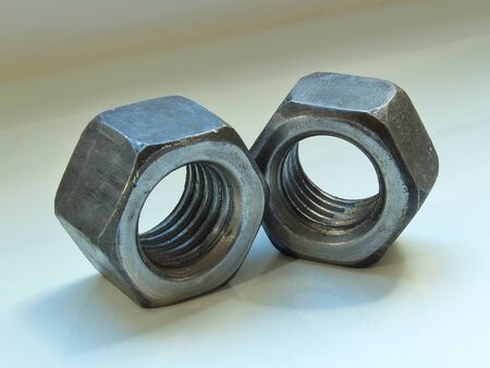 nuts industrial closeup carving blurred backgroundの写真素材