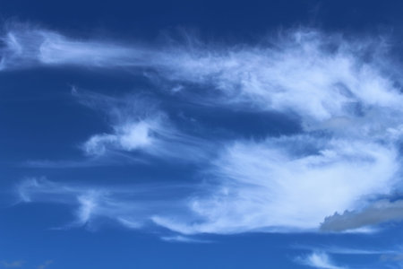 blue sky wind blows clouds texture background