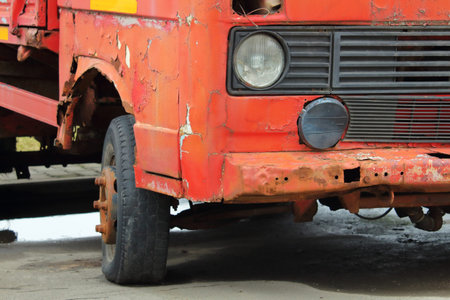 old wrecked rusty pickup truck waiting to be scrapped
