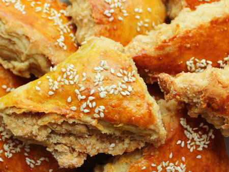fresh delicious pastries sprinkled with sesame seeds