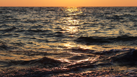 restless sea in the light of the evening sun
