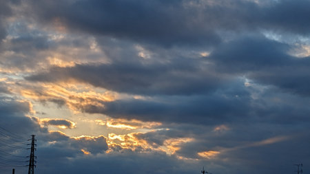 Beautiful orange gradation in the sky and clouds before sunsetの写真素材