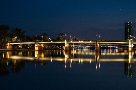nightshot of frankfurt city including bridges and scyscrapersの写真素材