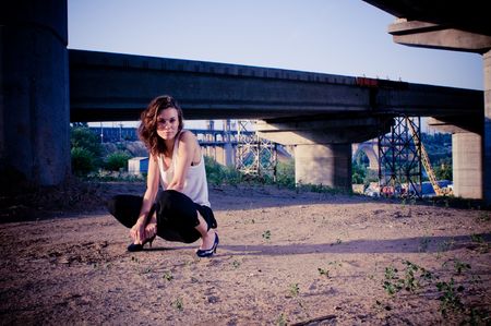 fashion model posing near the bridge construction, rnb styleの写真素材