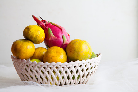 Orange in basketの写真素材