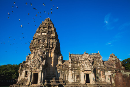 Birds flying on the Castle Rock, phimai in Thailand の写真素材