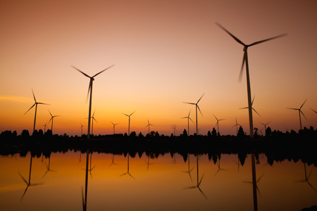 Wind turbine power generator at twilightの写真素材