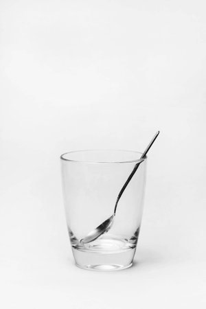 Glass mug and spoon Glass mug and spoon