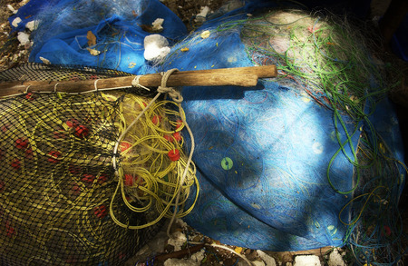 fishing net lay on the groundの写真素材