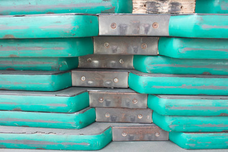 stacked wooden pallets in line assembly