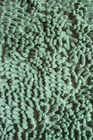 Green cleaning doormat or carpet textureの写真素材