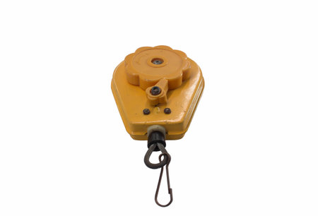 Compact spring balance with a hook on white backgroundの写真素材