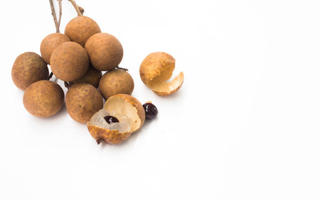 Longan shell casing,Longan on white background.の写真素材