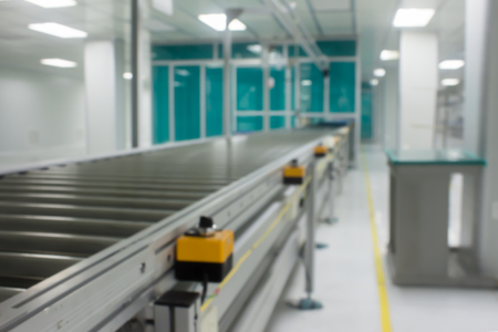 Special roller conveyor in clean room. picture blurredの写真素材