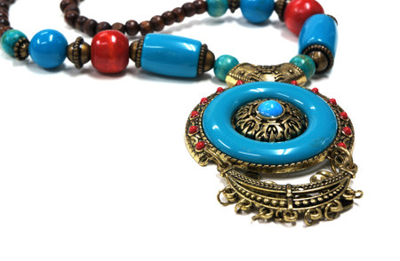 turquoise, brown necklace on isolated white backgroundの写真素材