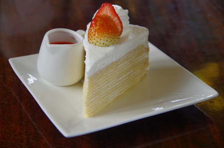 straberry crape cake with strawberry sauceの写真素材