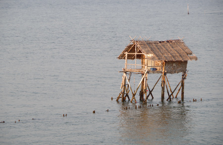 Cottage fishing on the seaの写真素材