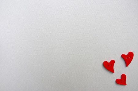 Heart shape studs arranged on drawing paperの写真素材