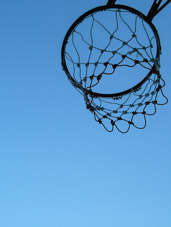 Basketball hoop in the blue skyの写真素材
