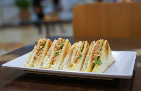 Tuna sandwich on wooden table, Selective focusの写真素材