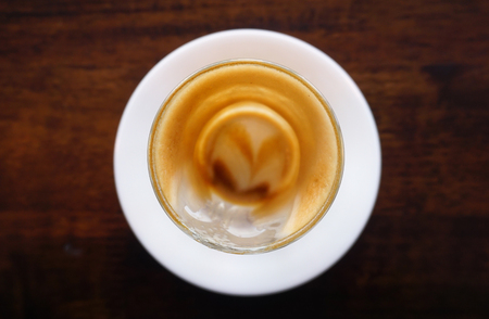 Empty cup of hot coffee put on the table, Selective focusの写真素材