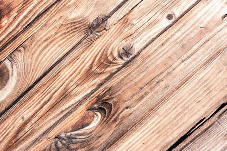 Wooden background made from narrow diagonal boards