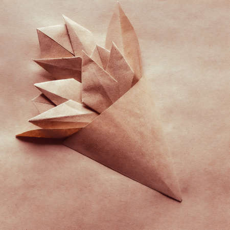 Bouquet of origami tulips on craft background. Paper made flowers.の写真素材