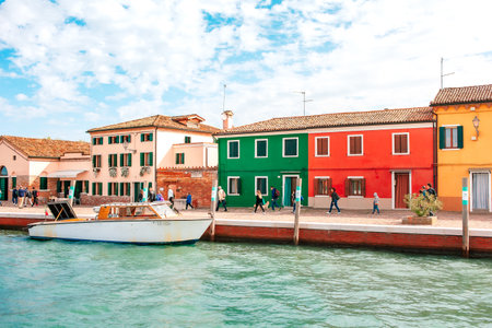 Burano, Venice, Italy - October 10, 2017: Street cafe and tourists on Burano island. Burano city lifestyleのeditorial素材