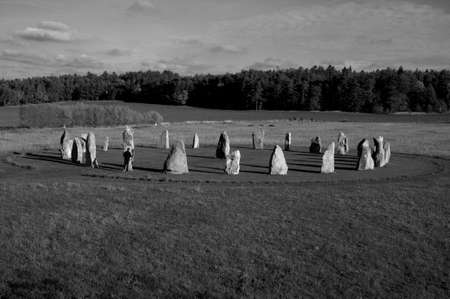 circle of stone monoliths in the meadowの写真素材
