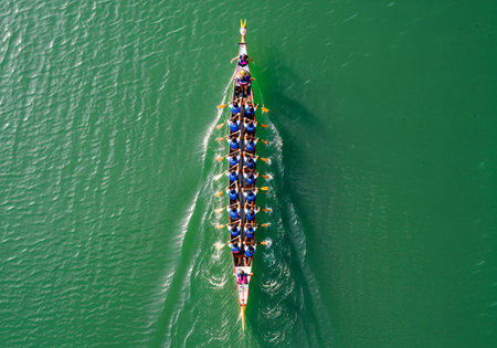 Aerial view of a rowing team in a rowboat.の素材