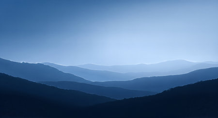 Mountain landscape with blue sky and clouds. Blue toned.の素材