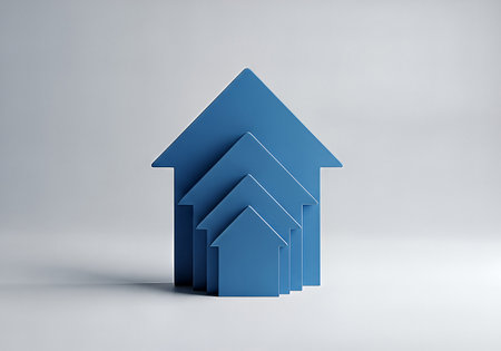 A minimalist composition featuring four blue house icons of increasing size, symbolizing growth, real estate, or upward trends against a clean, light gray background.の素材