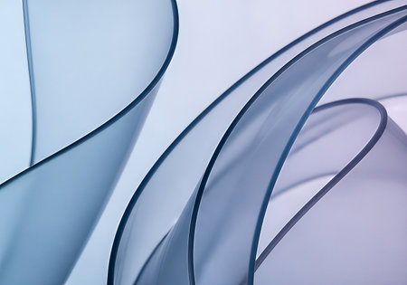 An abstract image showcasing flowing, translucent blue curves against a soft, gradient background. The composition emphasizes form, light, and shadow, creating a sense of depth and movement. The lighting is diffused, enhancing the smooth textures and minimalist aesthetic.の素材
